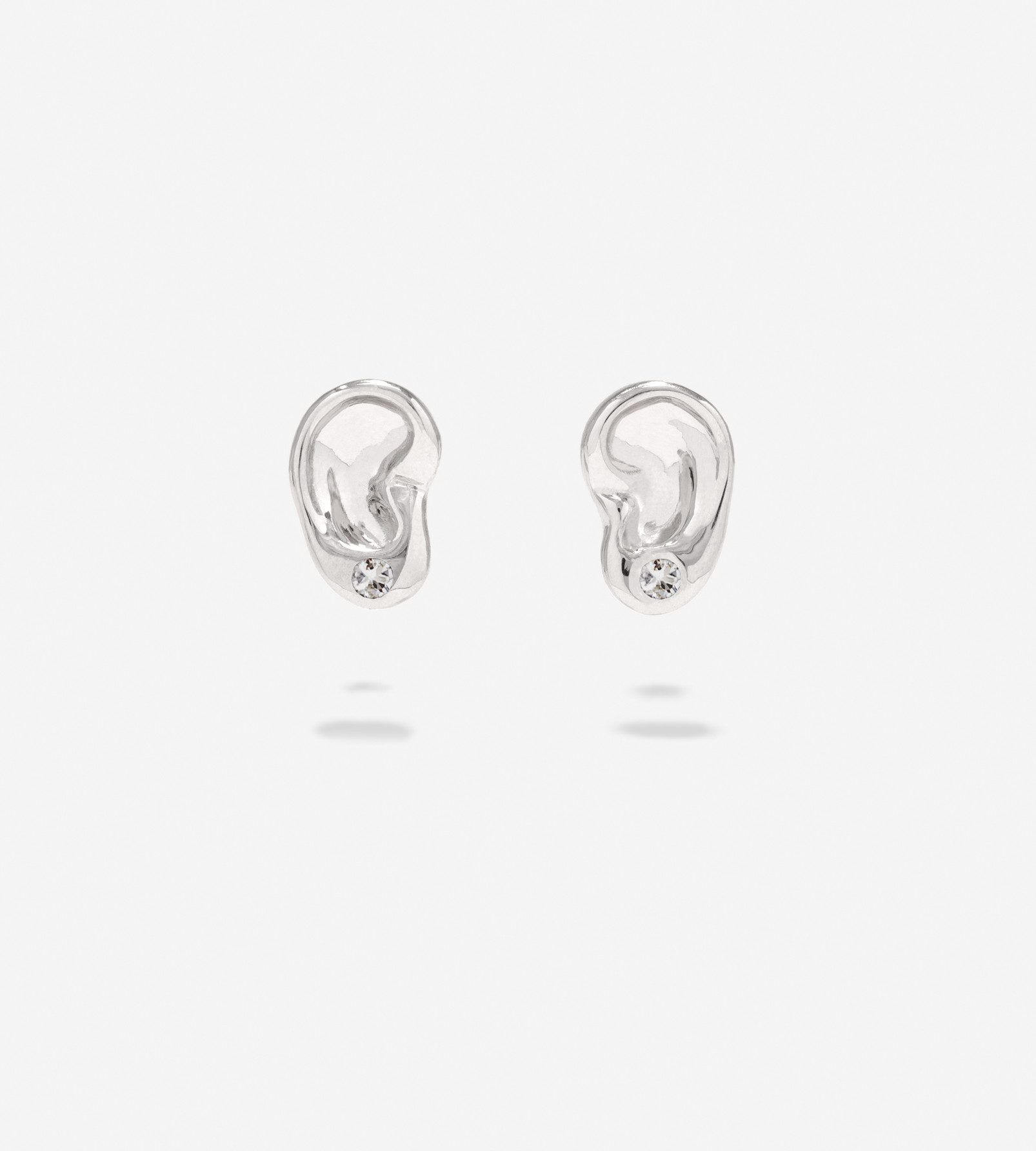 silver earring with clear stone