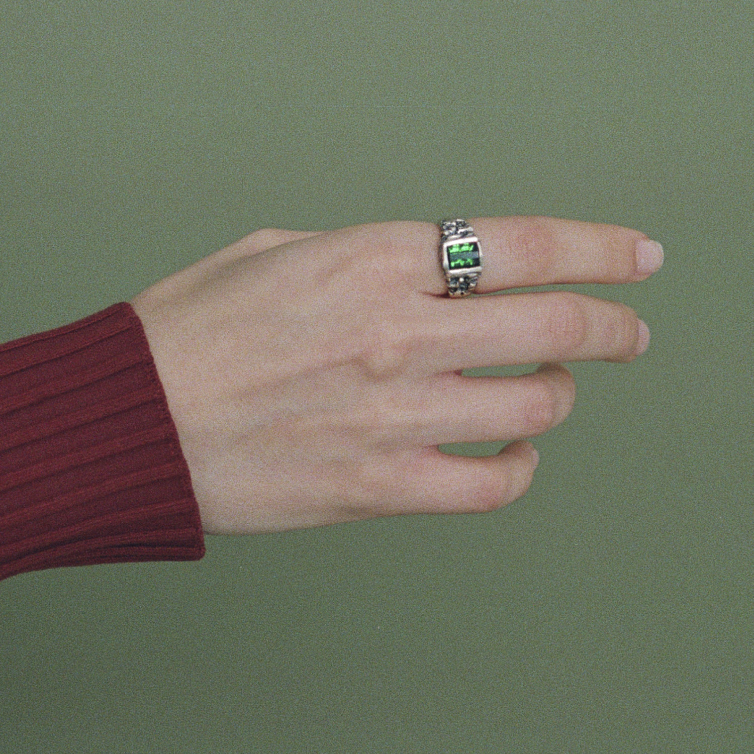 Sterling silver ring with zigzag cut tourmaline.