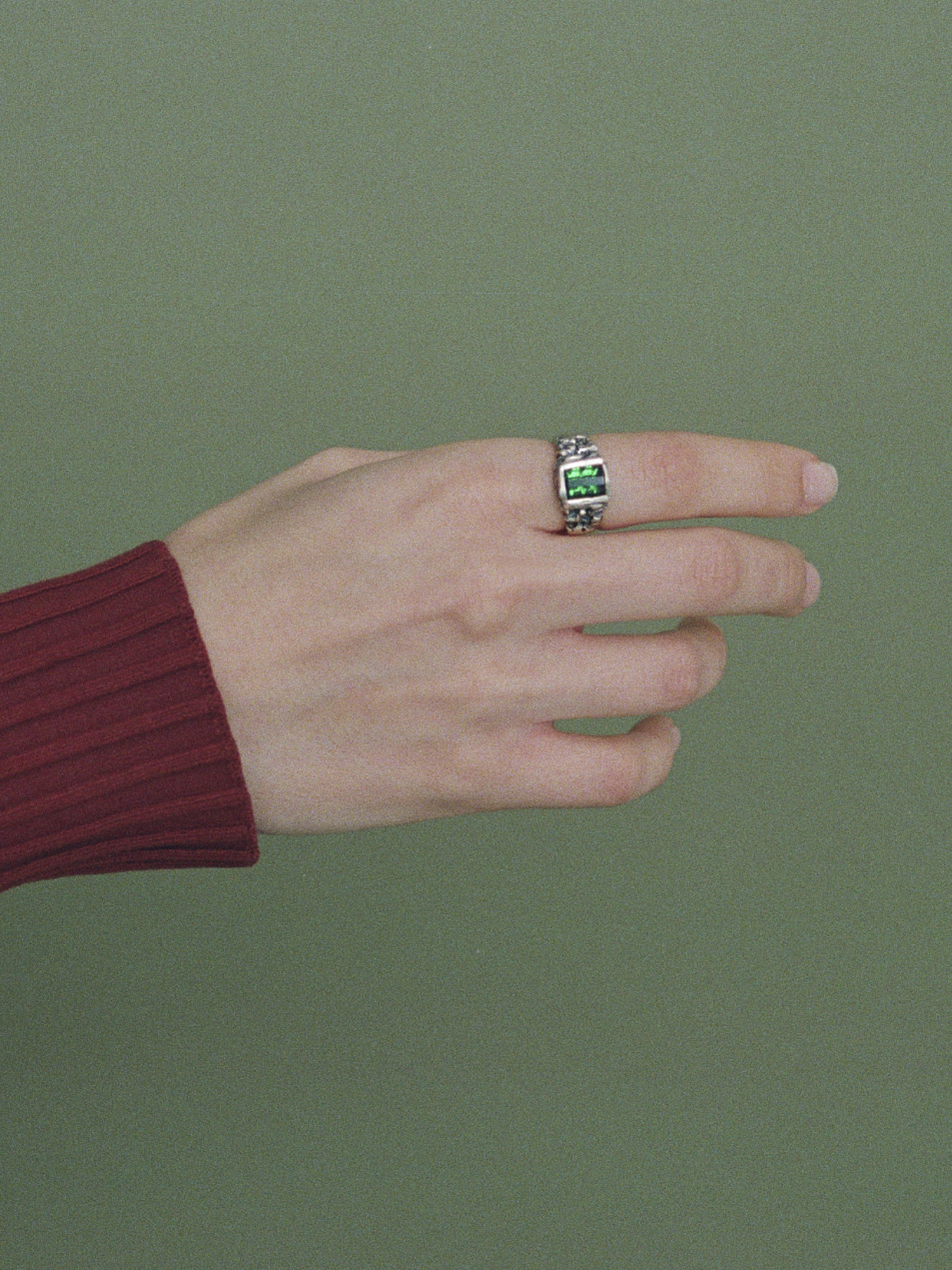 Sterling silver ring with zigzag cut tourmaline.