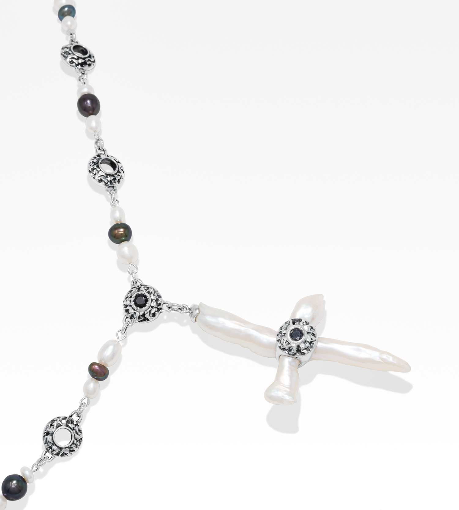 Freshwater cross pearl necklace with sterling silver and black sapphire accents.