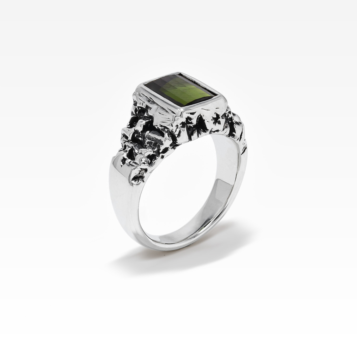 Sterling silver ring with zigzag cut tourmaline.