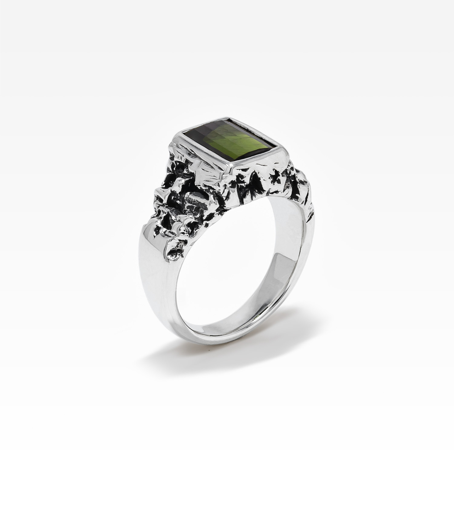 Sterling silver ring with zigzag cut tourmaline.