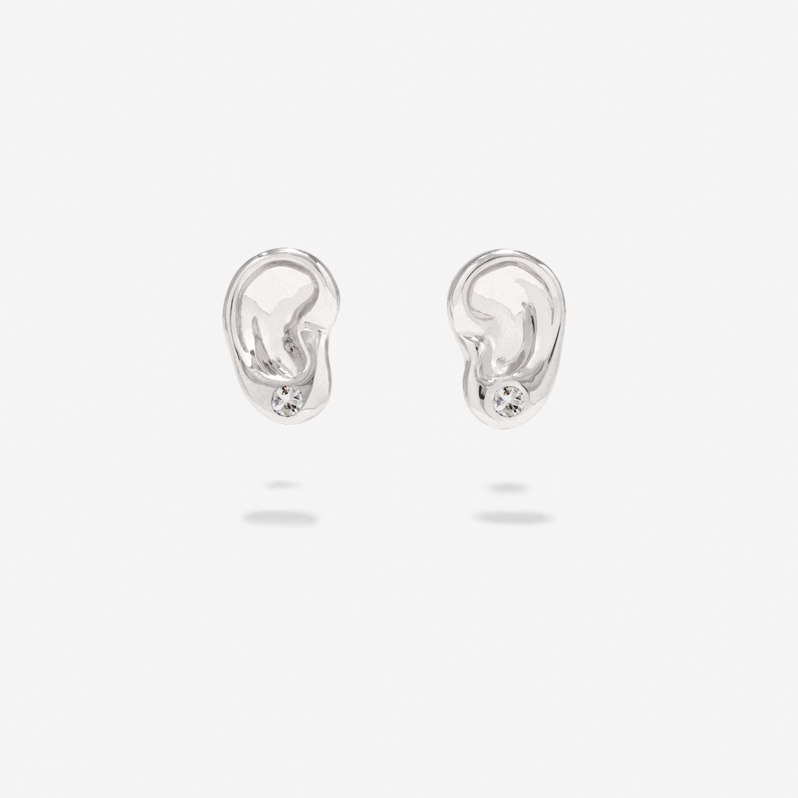 silver earring with clear stone