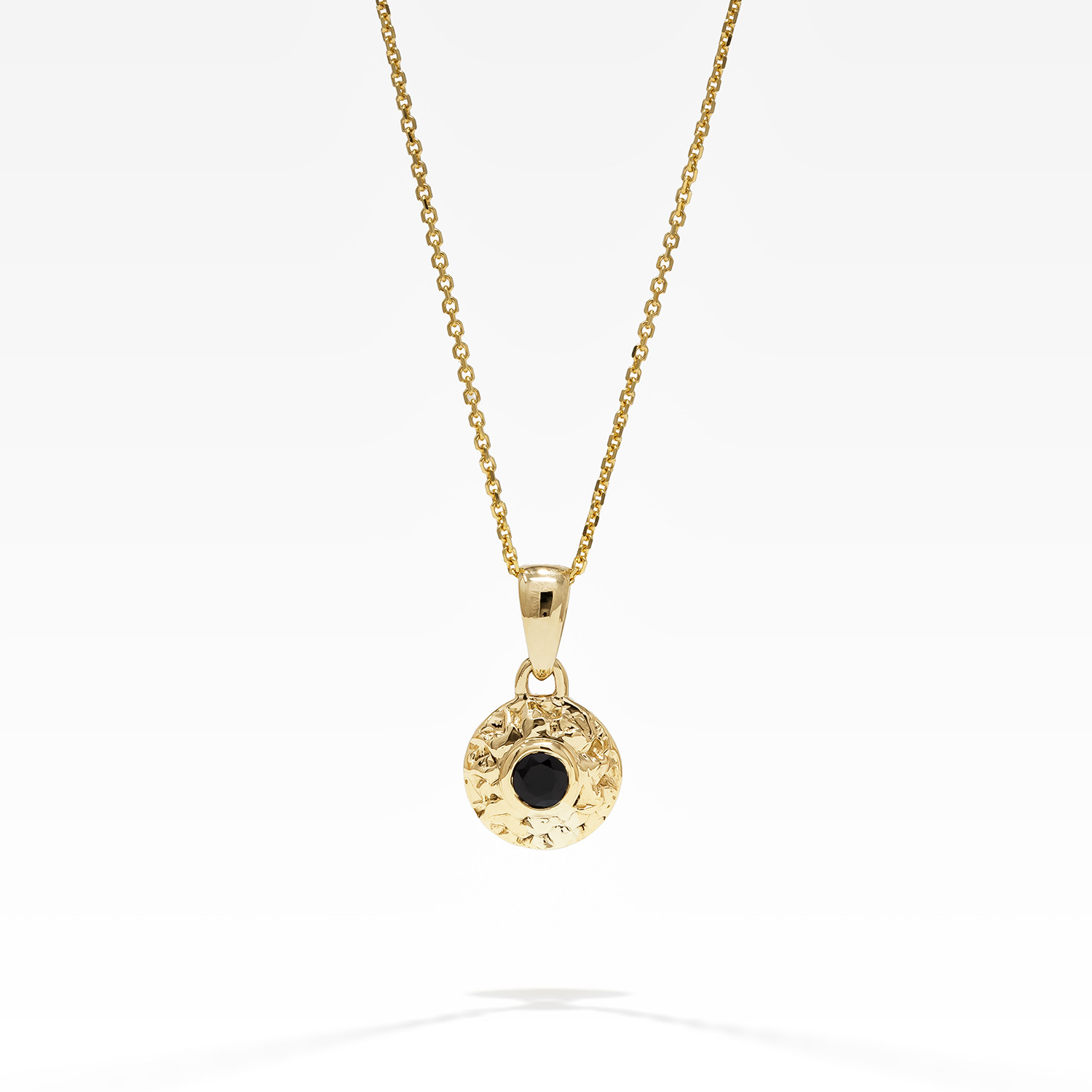 gold pendant with black sapphires stone on gold chain