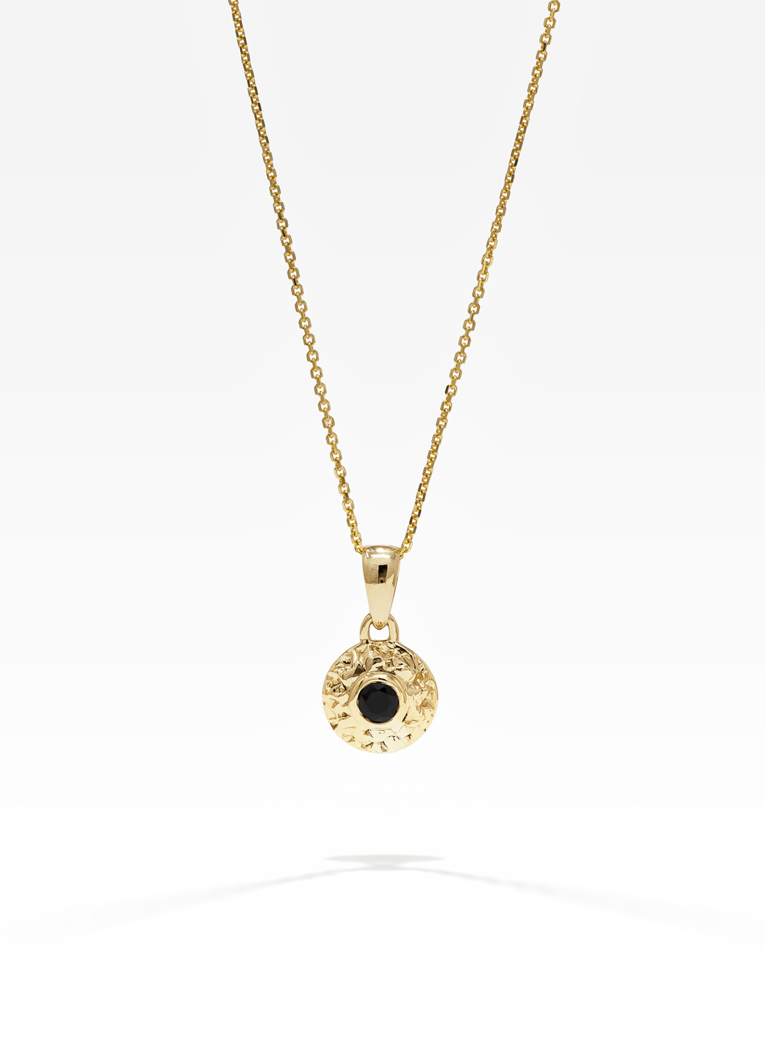 gold pendant with black sapphires stone on gold chain